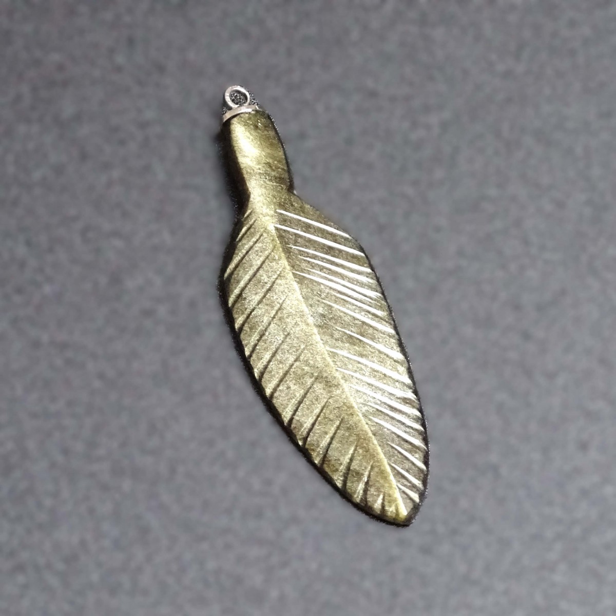 Obsidian gold feather pendant, Mexico