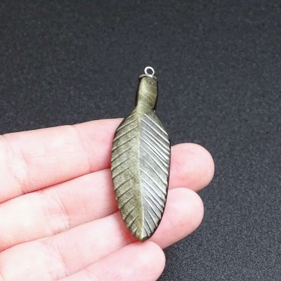 Obsidian gold feather pendant, Mexico