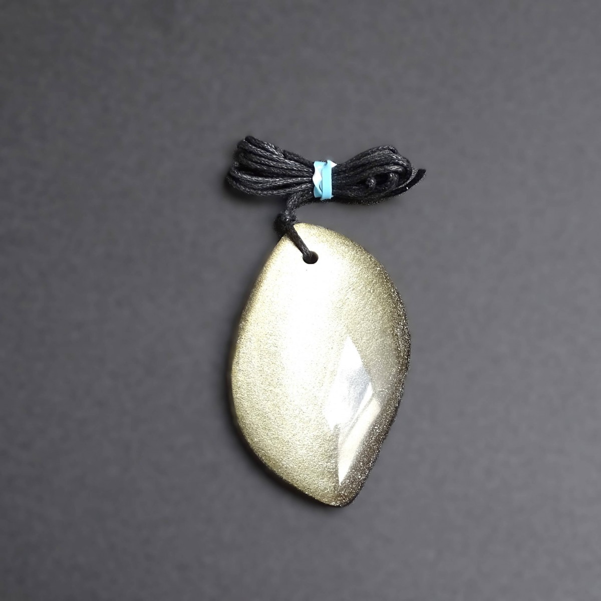 Obsidian gold pendant, Mexico