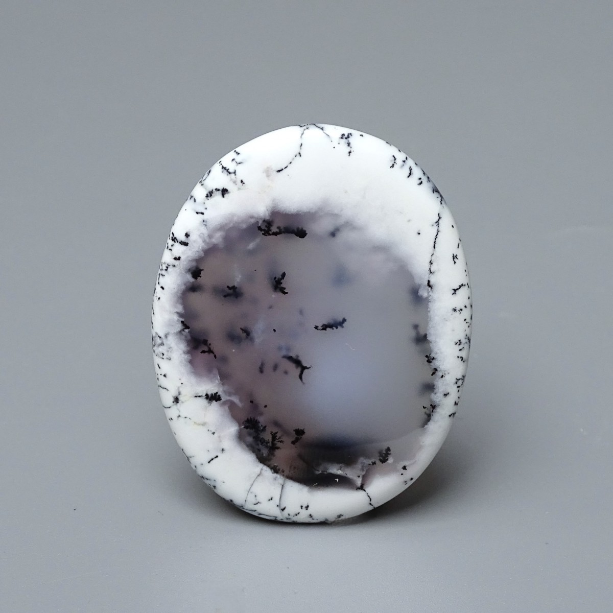 Dendritic opal (merlinite) cabochon 13.4g, Madagascar